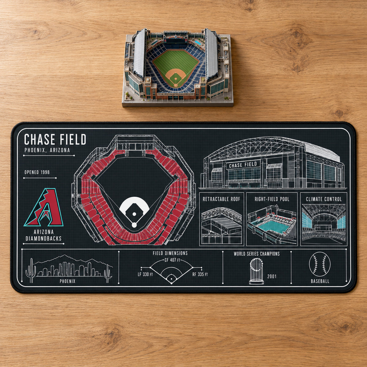 Arizona Diamondbacks Chase Field blueprint desk mat, 16" x 32", on a wooden desk with a decorative stadium model